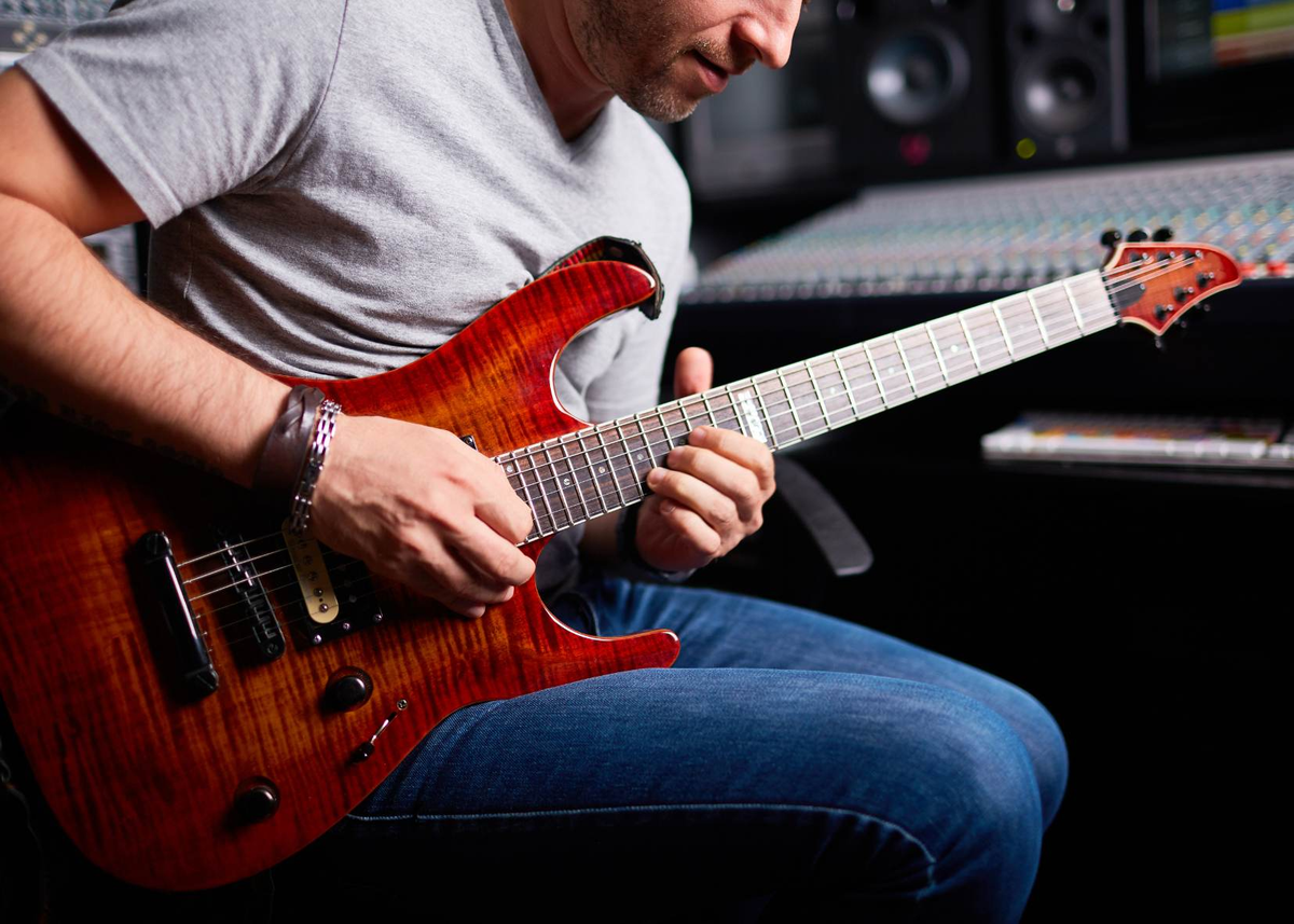 Você Sabia que Aula de Guitarra Traz Benefícios?